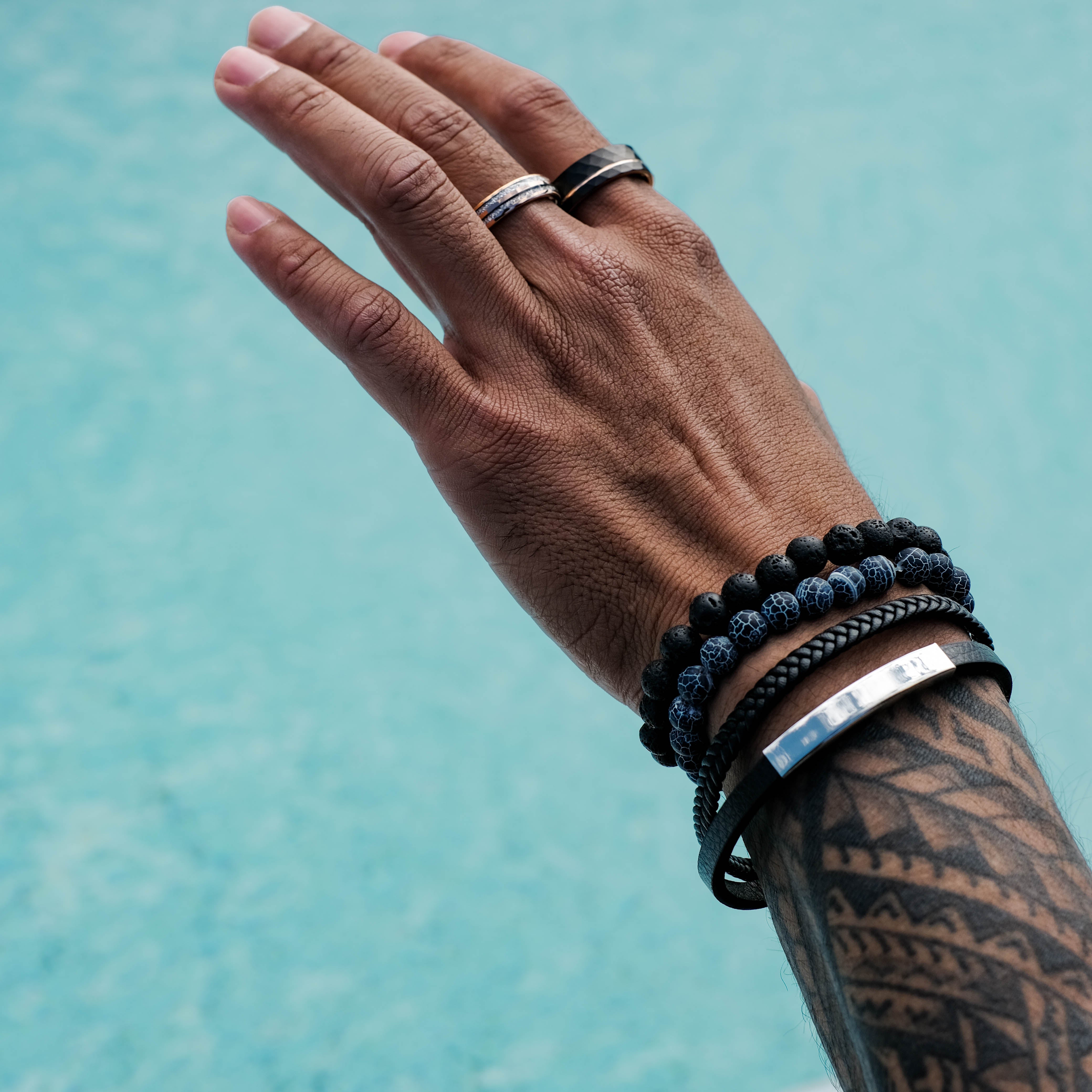 The Magnate - Black 8mm Faceted With Rose Gold Inlay Tungsten Ring
